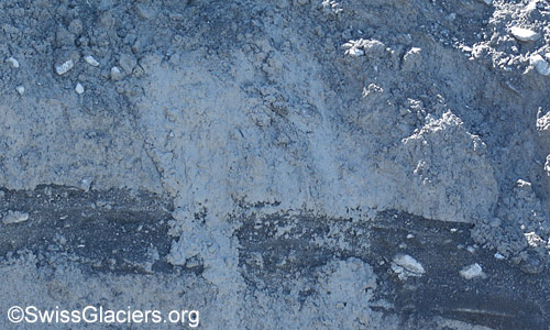 Detail from the wall below location 22. Photo taken on August 31, 2025.